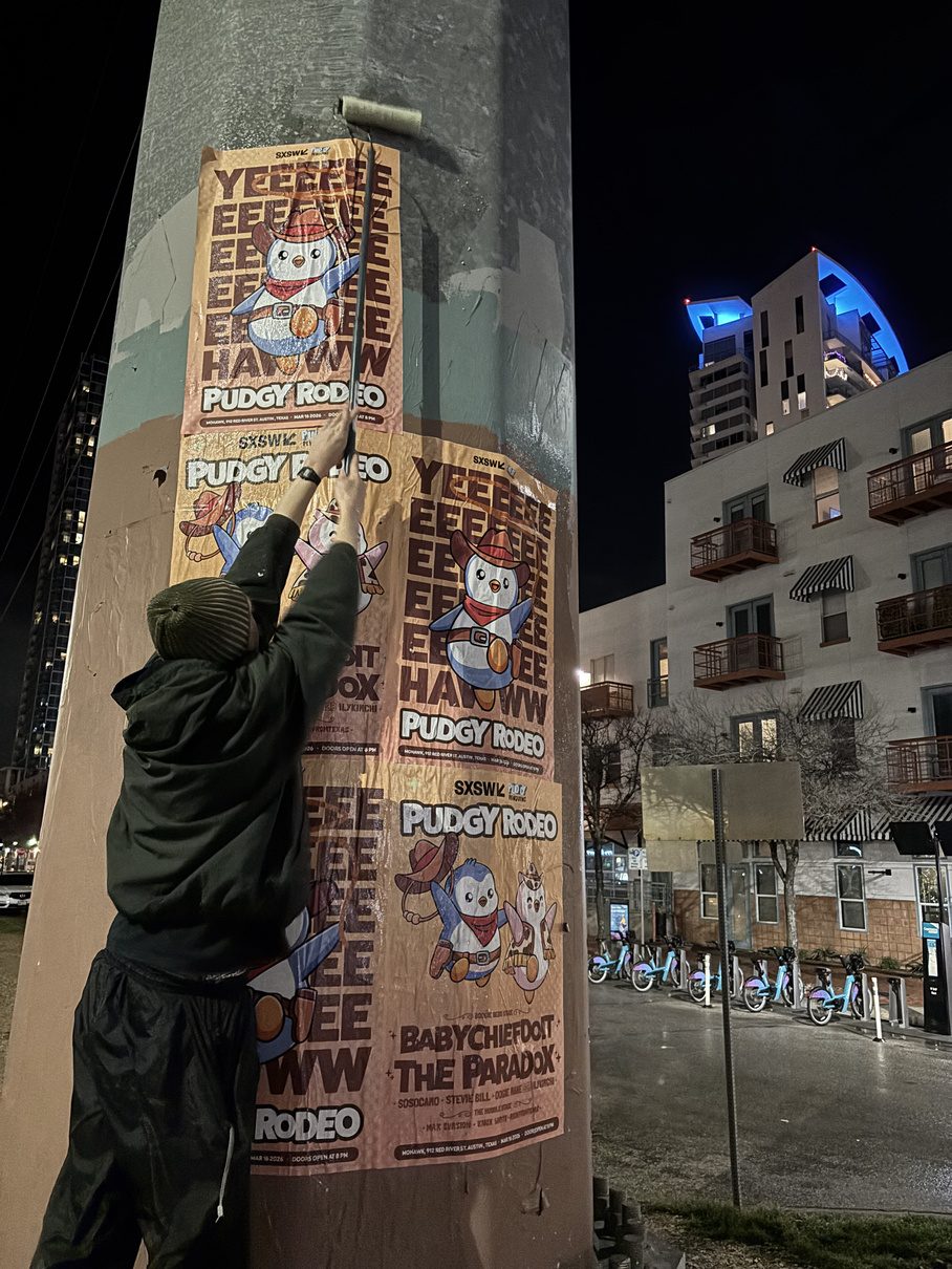 Street team wheat pasting posters